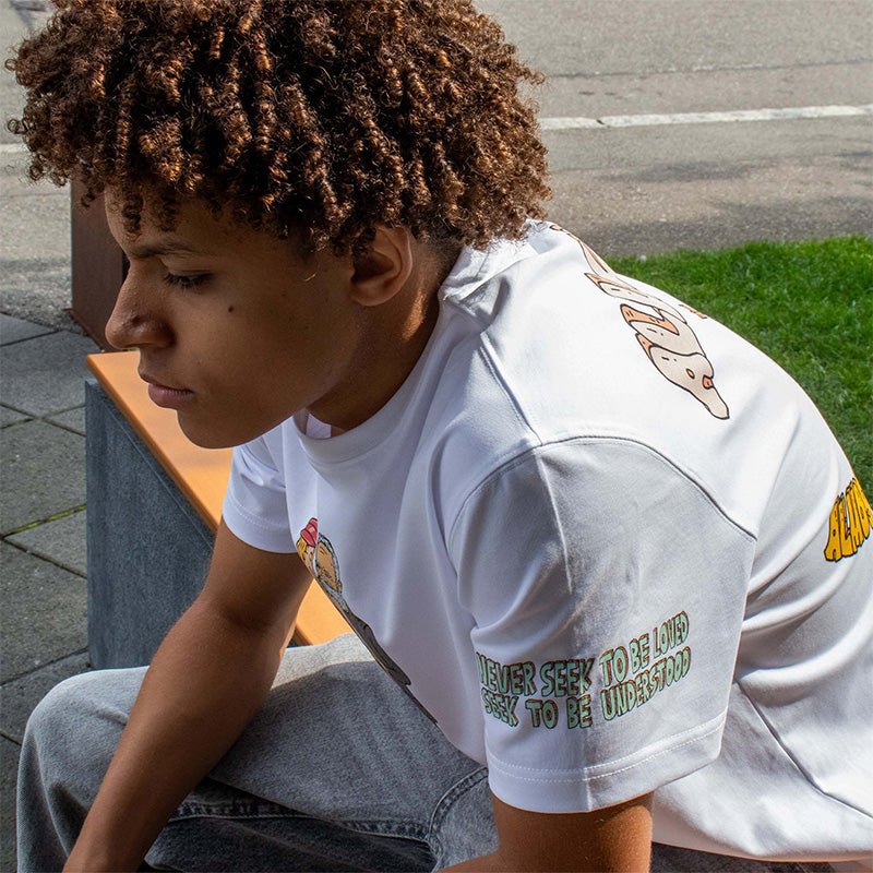 Allmosst Pay my rent white t-shirt on a model.