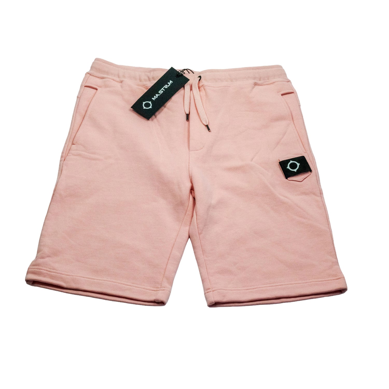 Pink shorts with brand tags on a white background