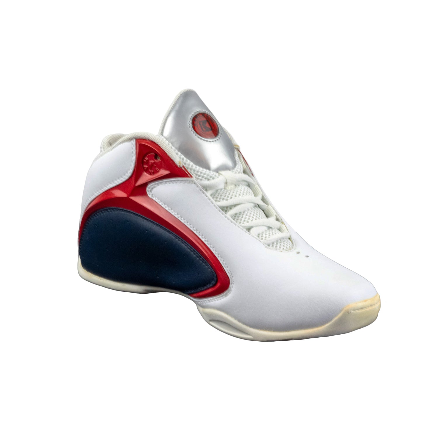 White sneaker with red and blue accents on a white background