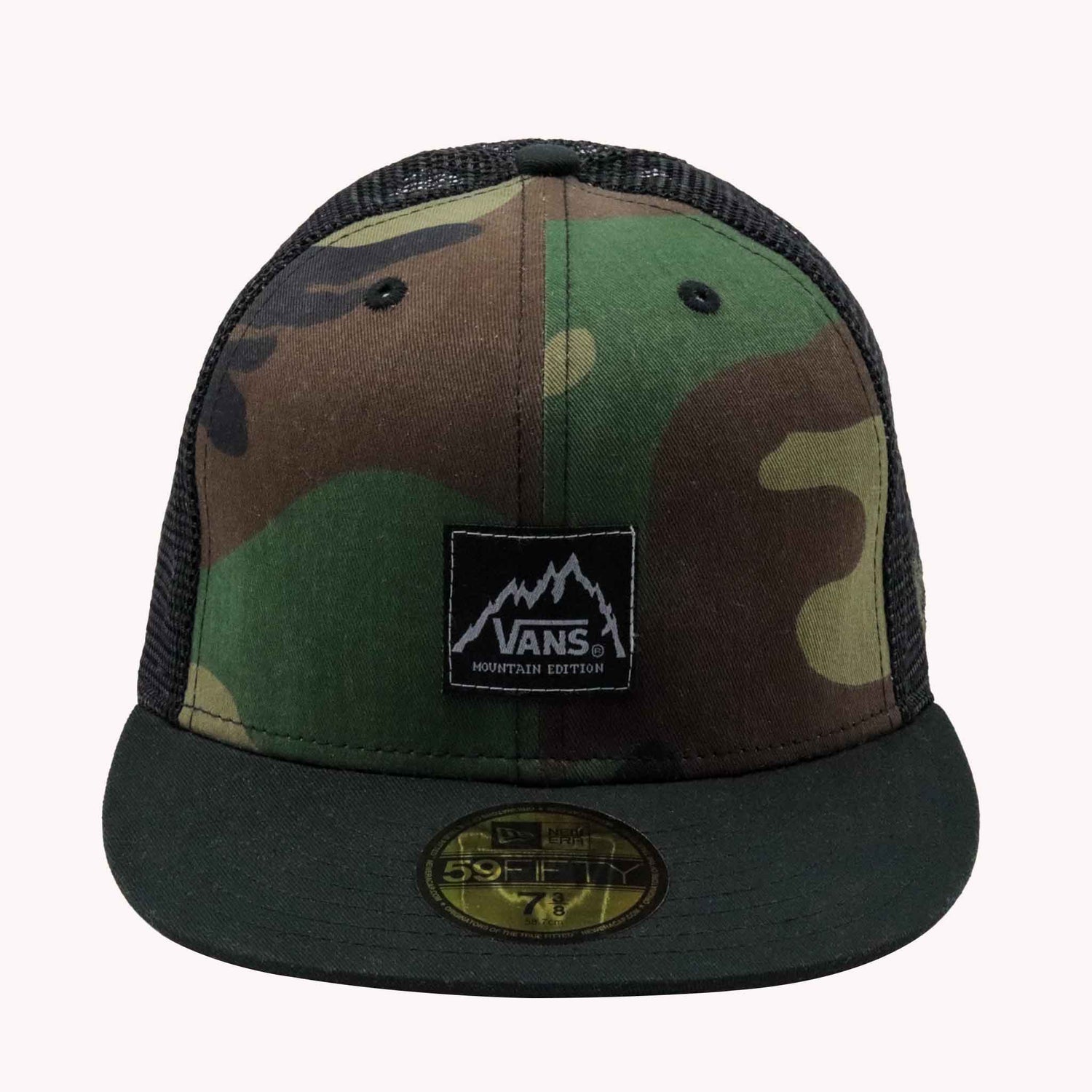 Camouflage trucker hat with Vans logo on a white background