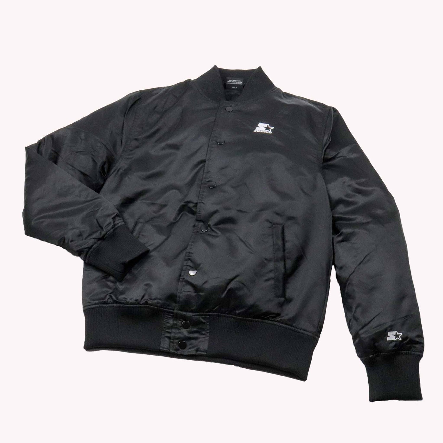 Black jacket with a brand logo on a white background