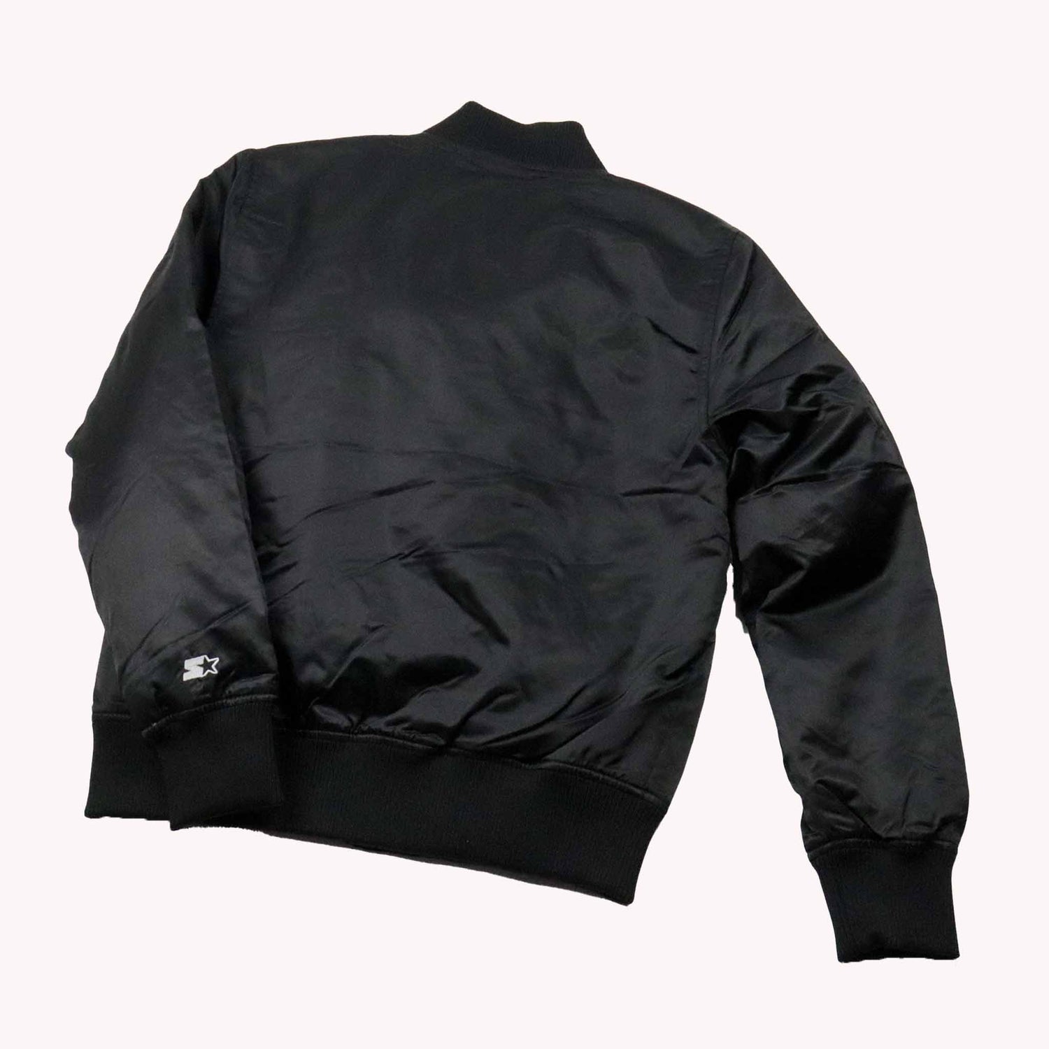 Black bomber jacket on a white background