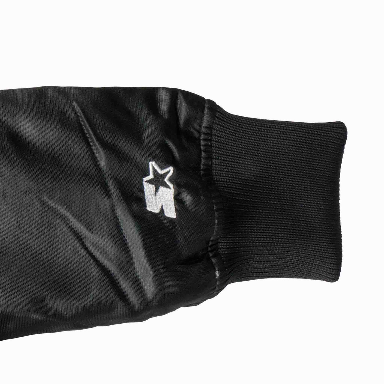 Black sleeve with a white logo on a white background