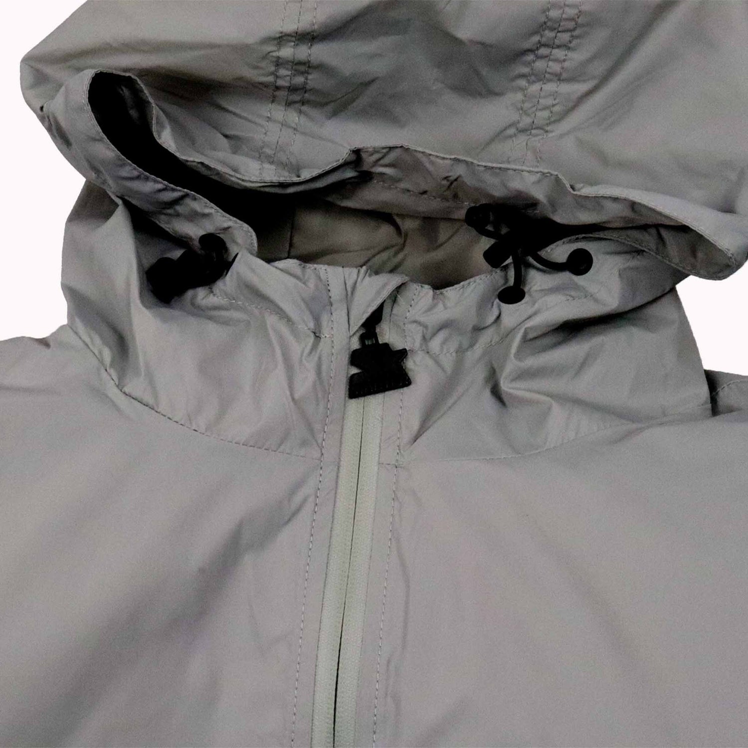 Close-up of a light gray jacket with a hood on a white background