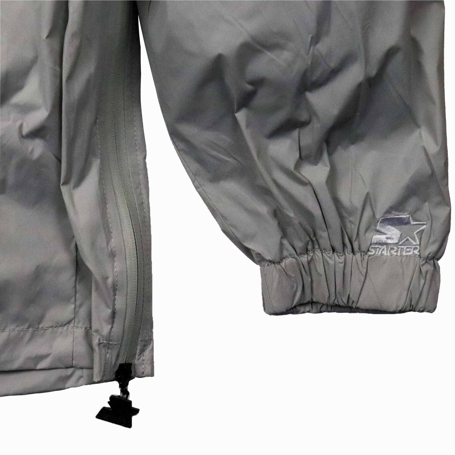 Gray jacket with a visible brand logo on a white background