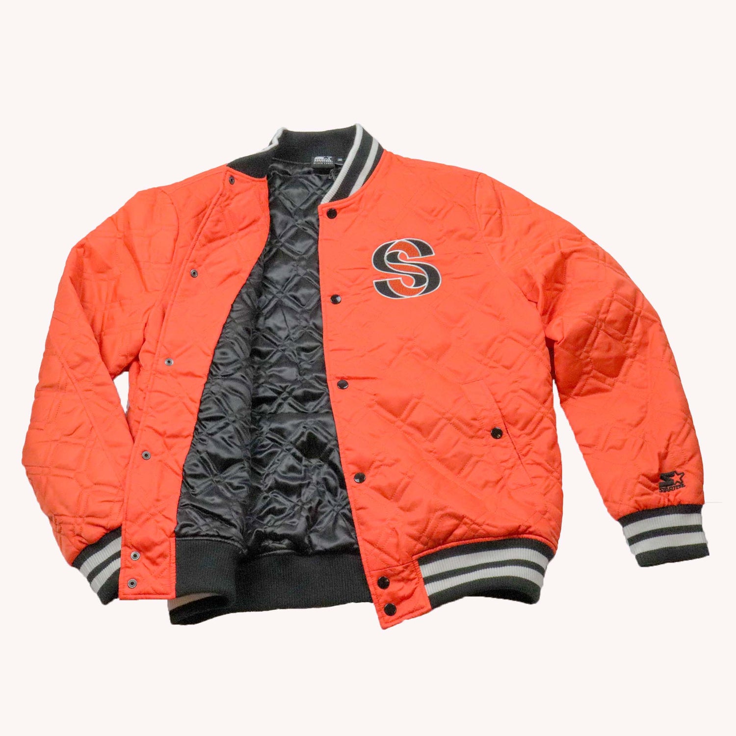 Orange varsity jacket with black interior and gray accents on a white background