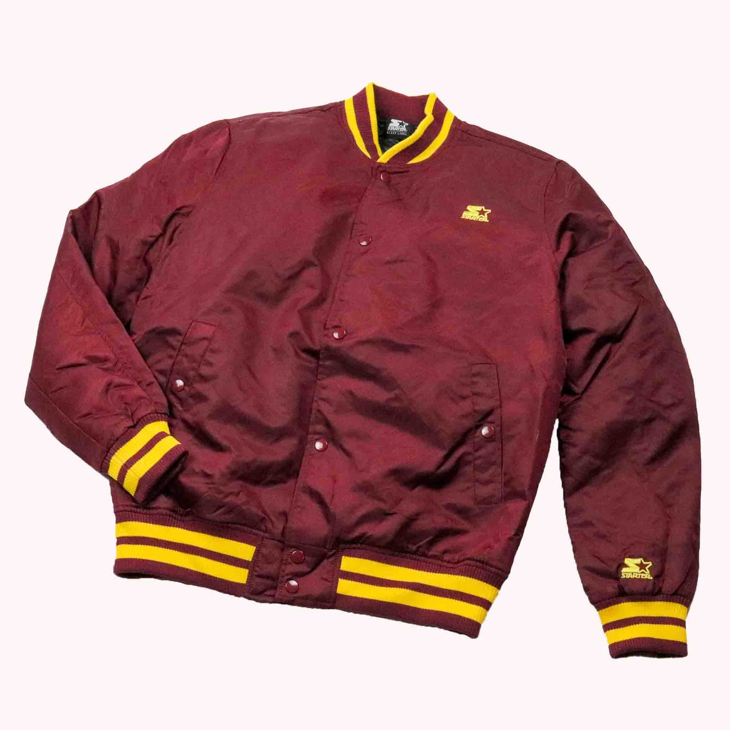 Maroon jacket with yellow accents on a white background