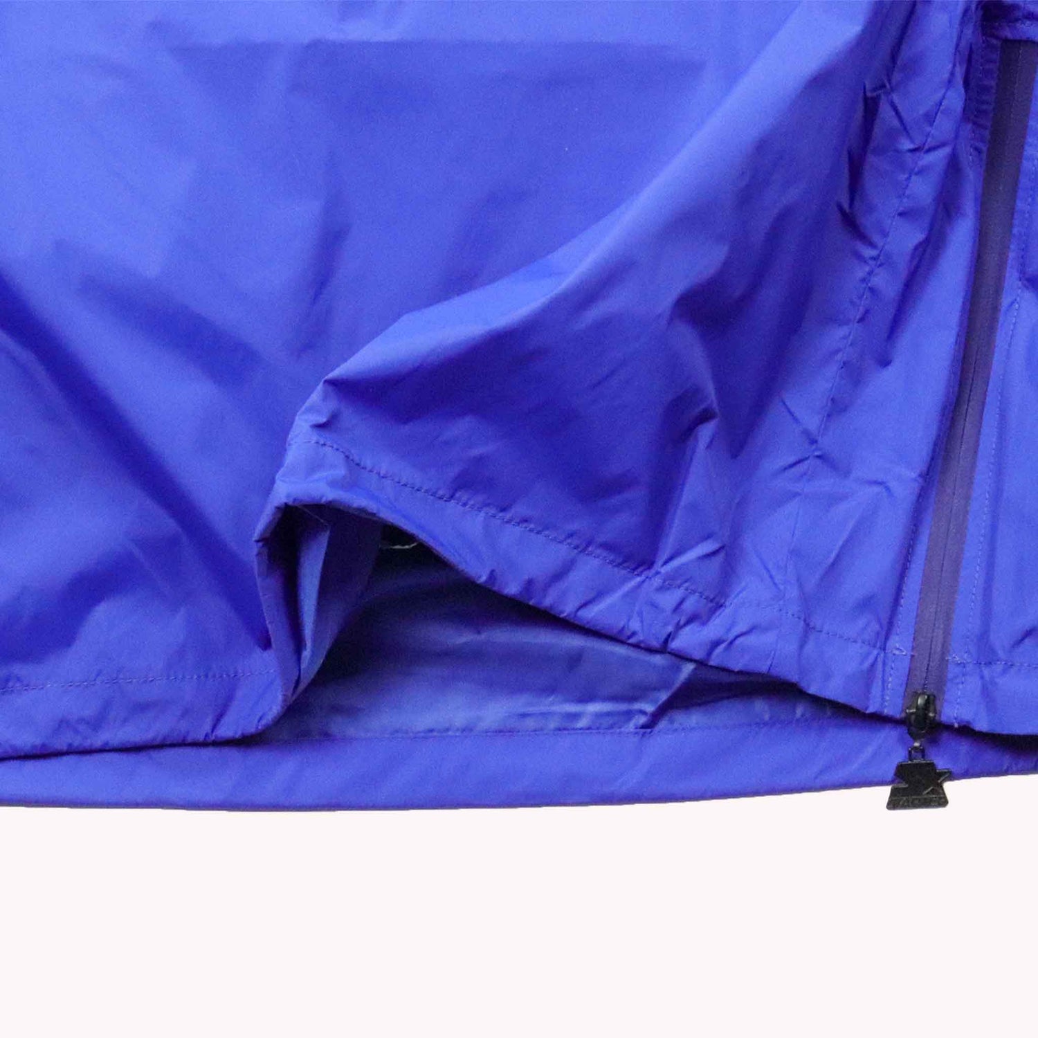 Close-up of a blue tarp with a zipper on a white background