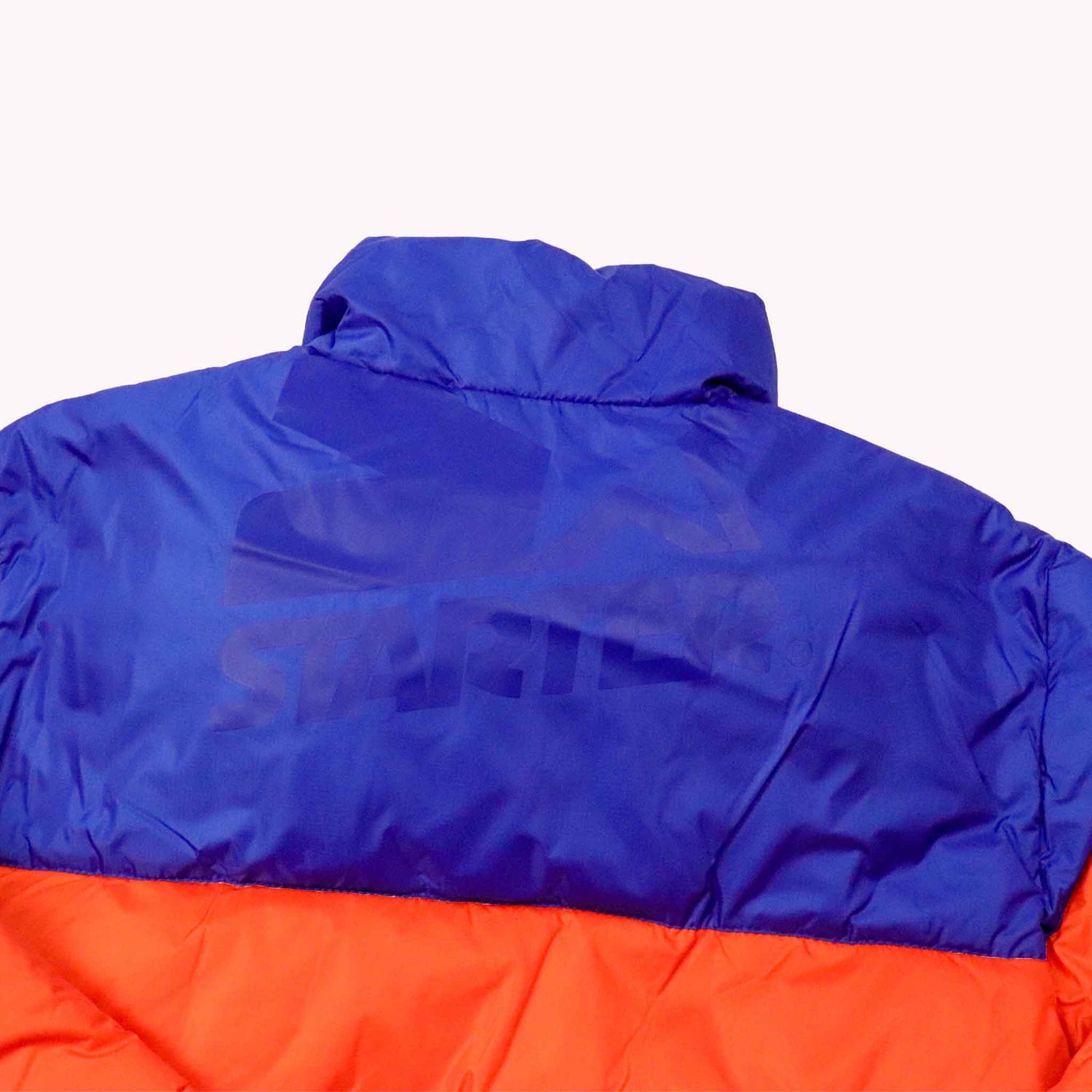 Blue and orange jacket on a white background