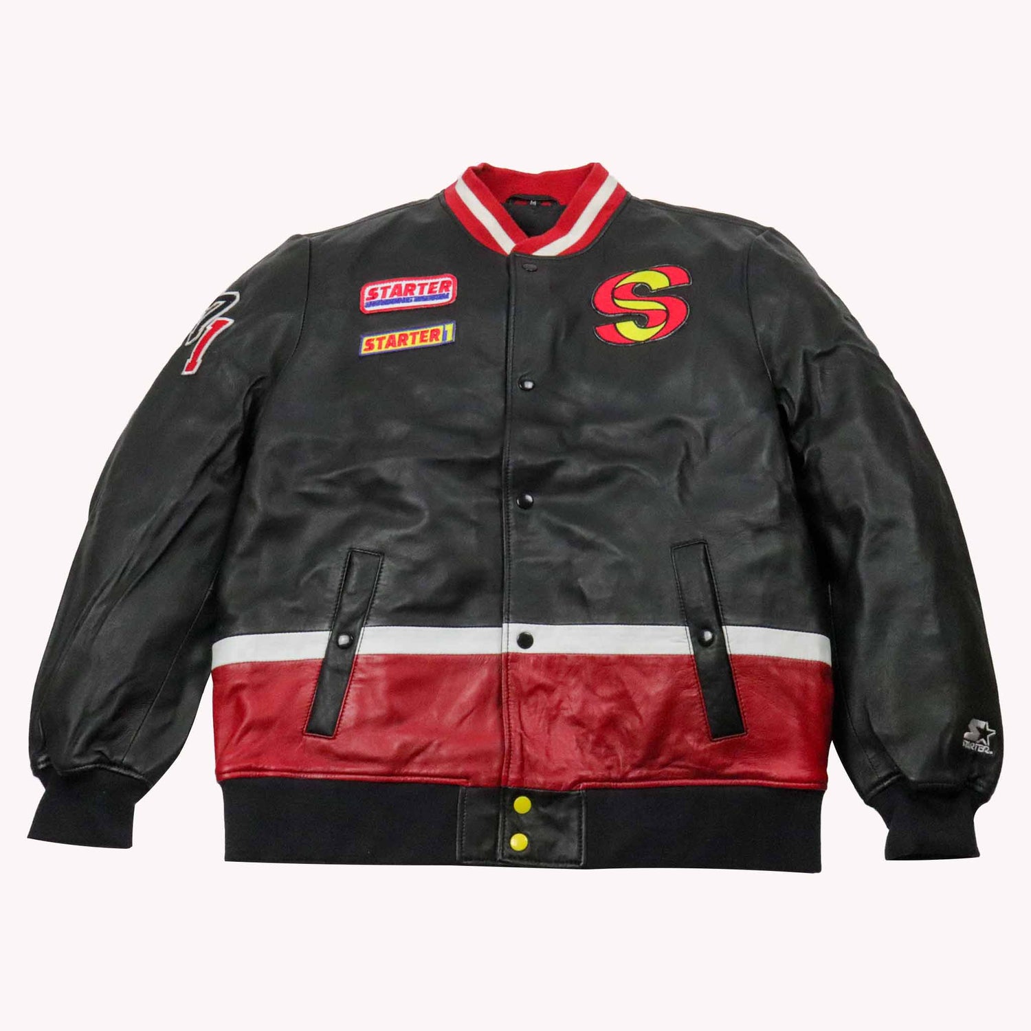 Black and red jacket with visible branding on a white background