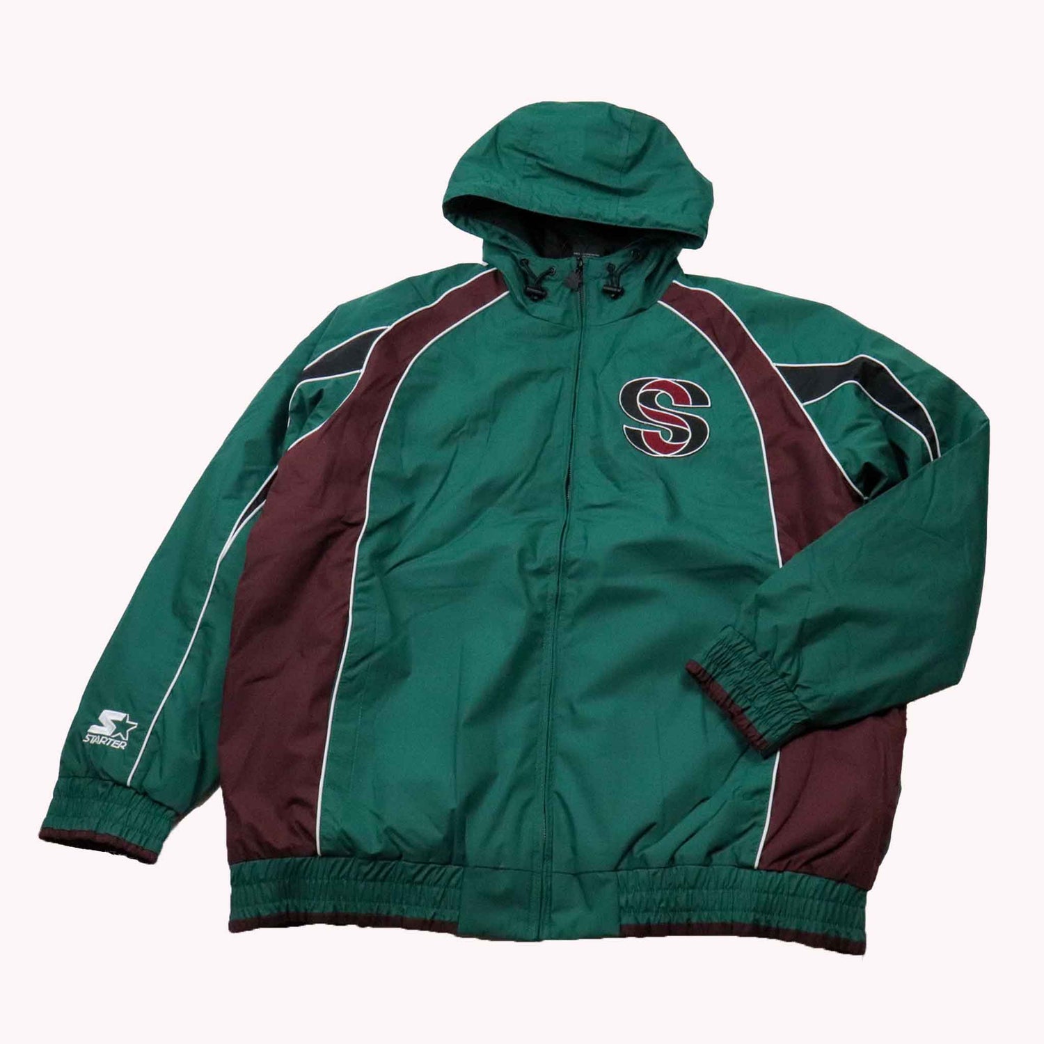 Green and maroon jacket with a logo on a white background