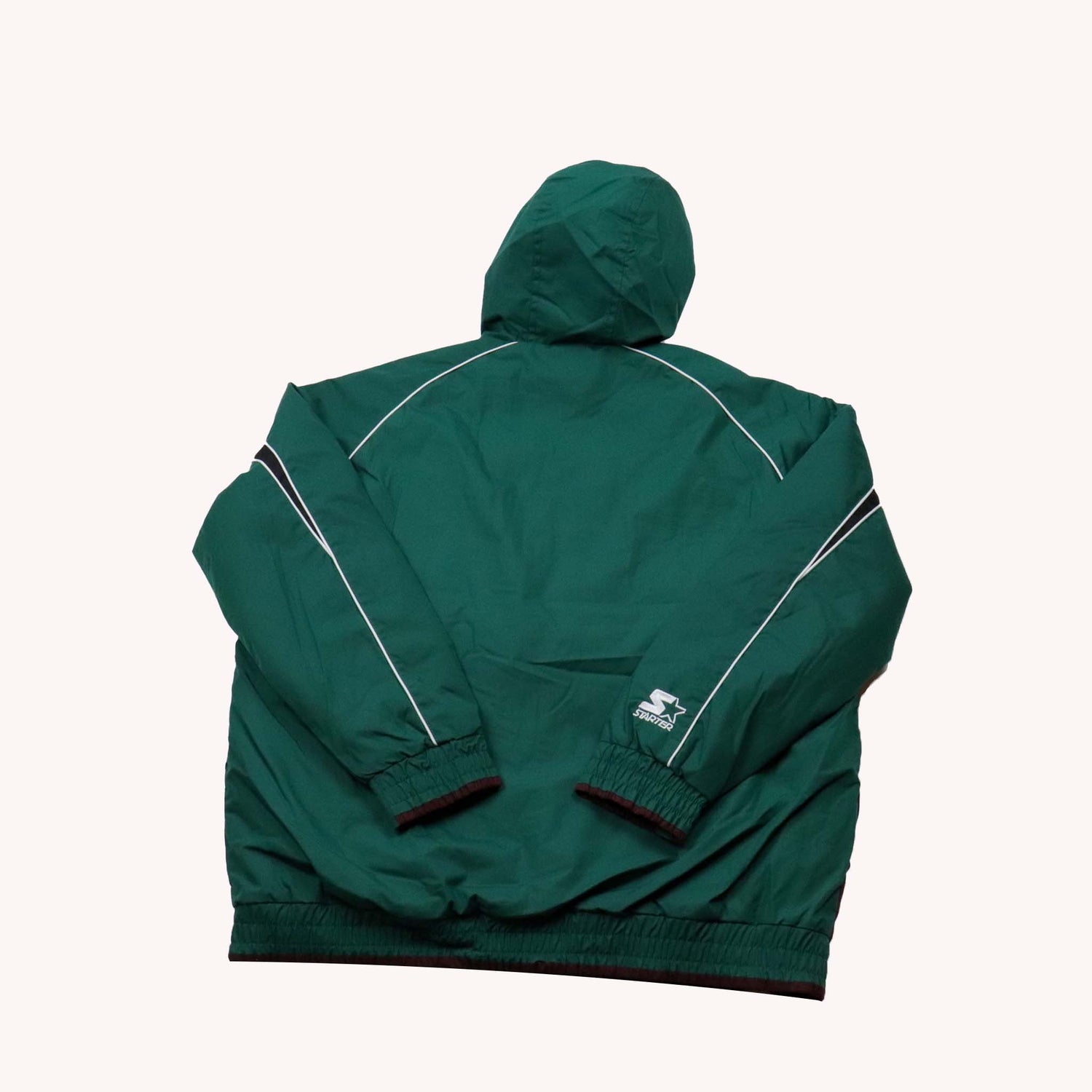 Green jacket with white accents on a white background