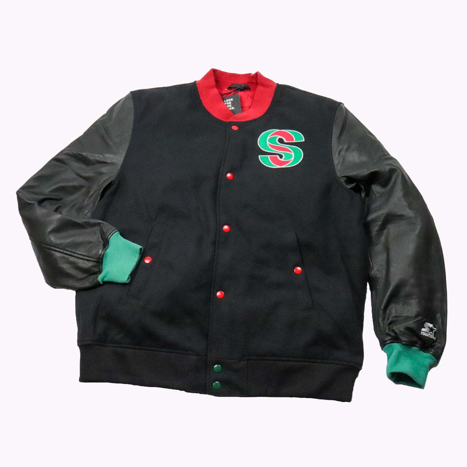 Black varsity jacket with red and green accents on a white background