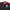 Black letterman jacket with red collar and green and red logo on a white background