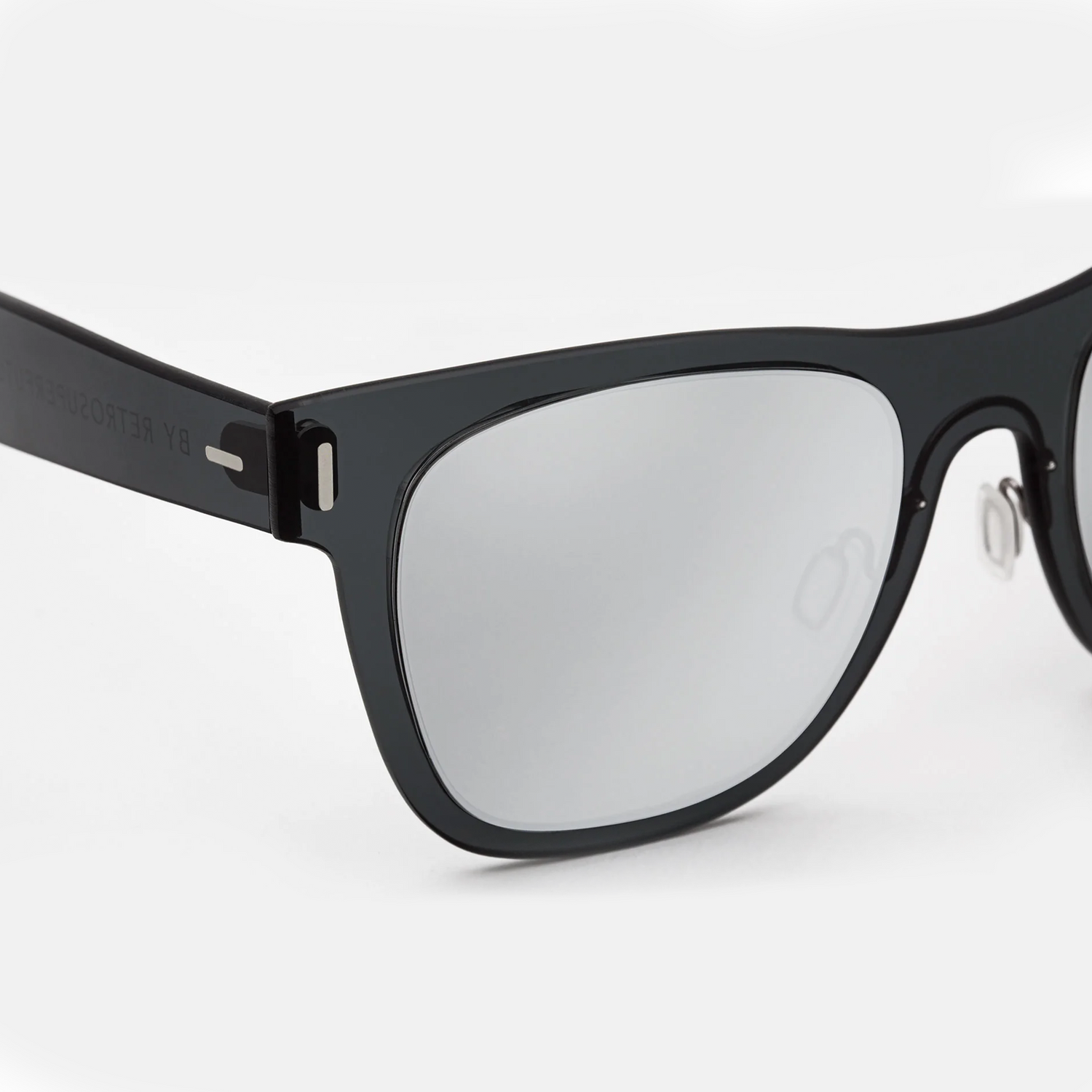 Retrosuperfuture Duo-Lens Classic  Sunglasses. A classic image on a white background, just a simple side view