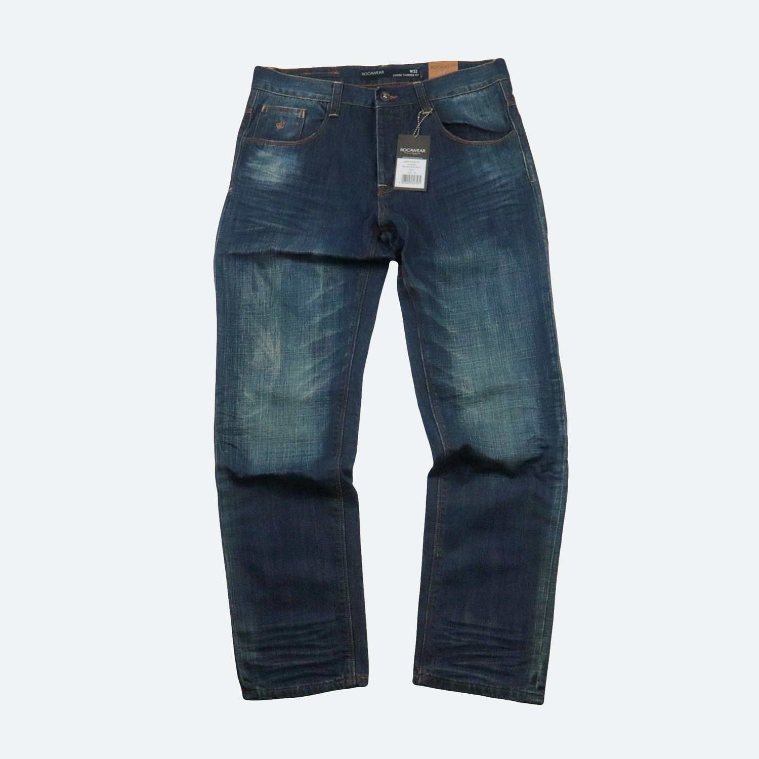 A pair of Rocawear men's loose tapered fit denim jeans pants with a faded and distressed finish.