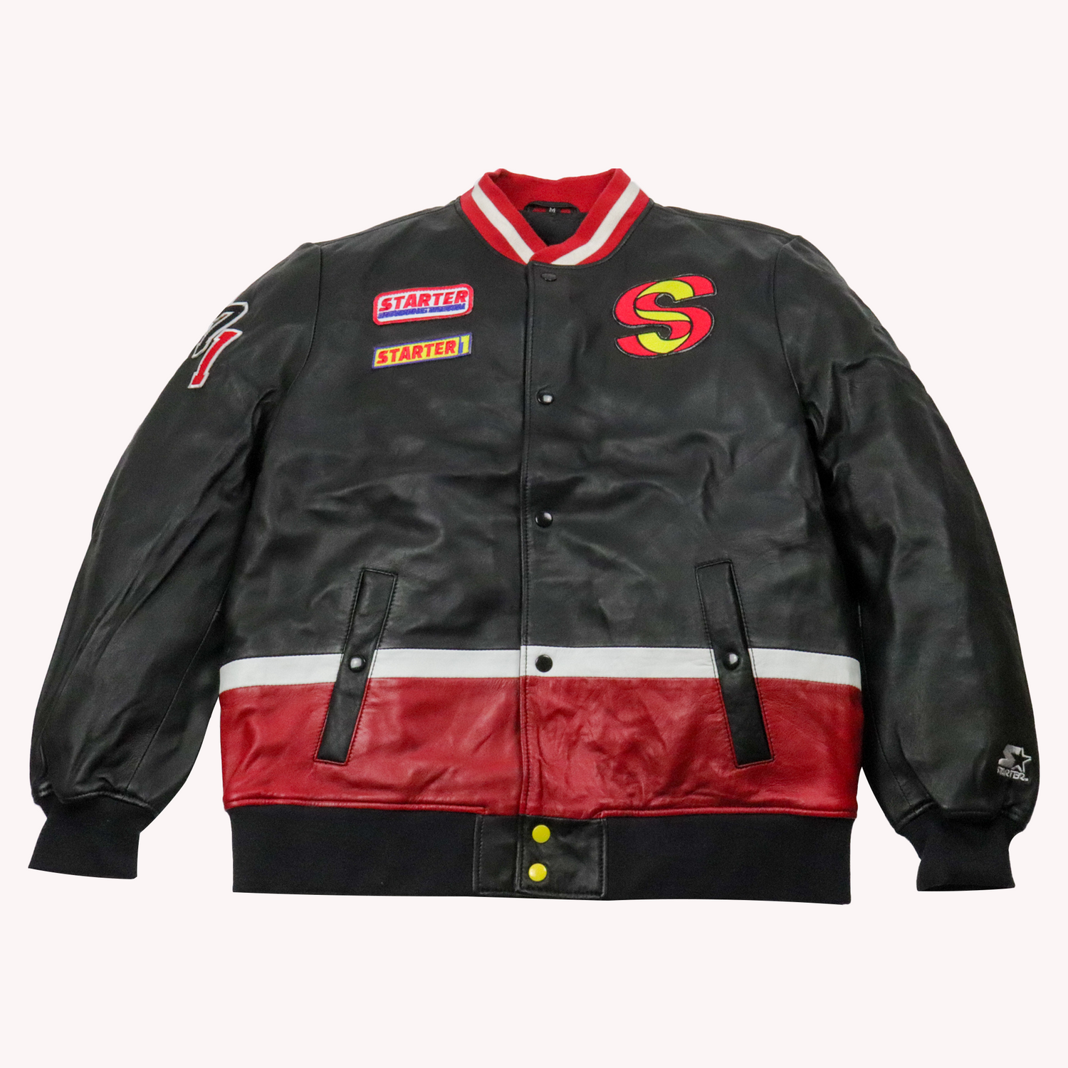 Men's black leather racing jacket with red and white accents and vintage racing branding on the chest.